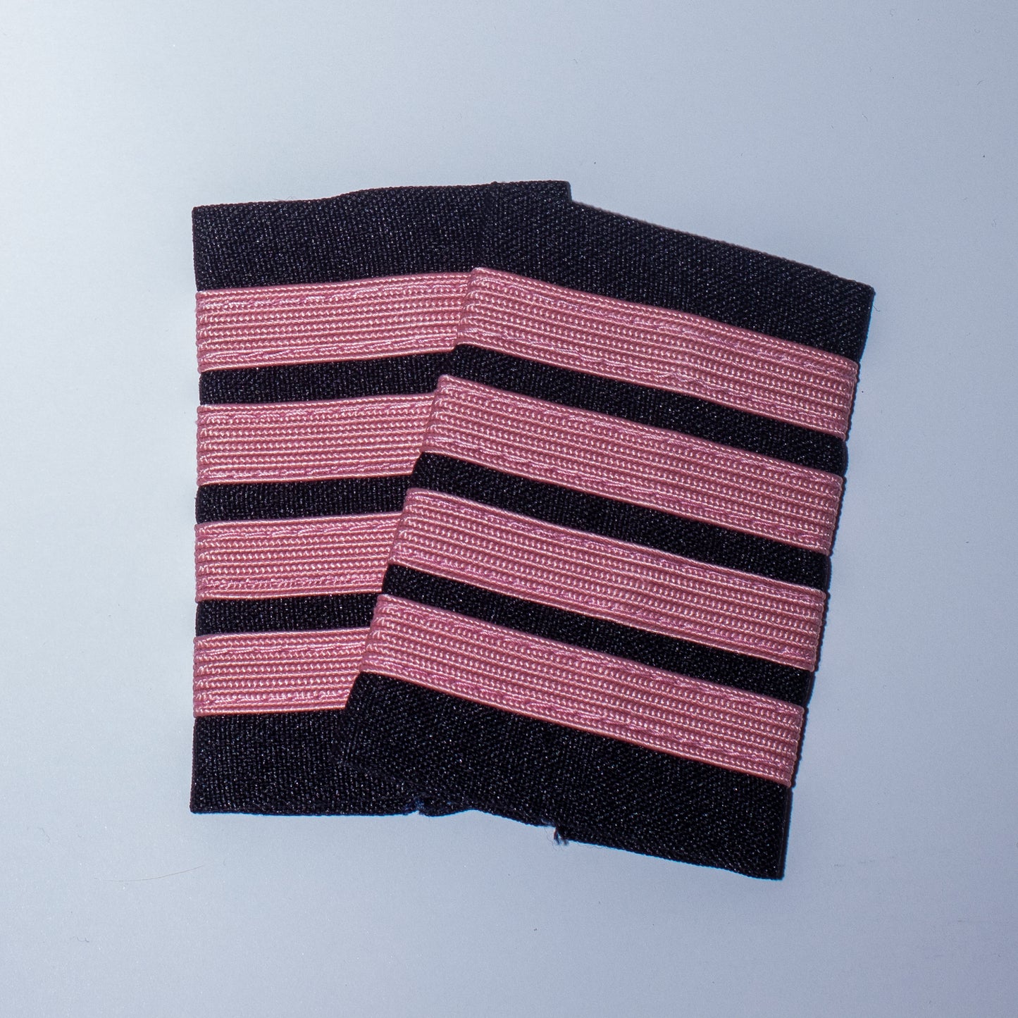 EPAULETS, PINK NYLON ON BLACK
