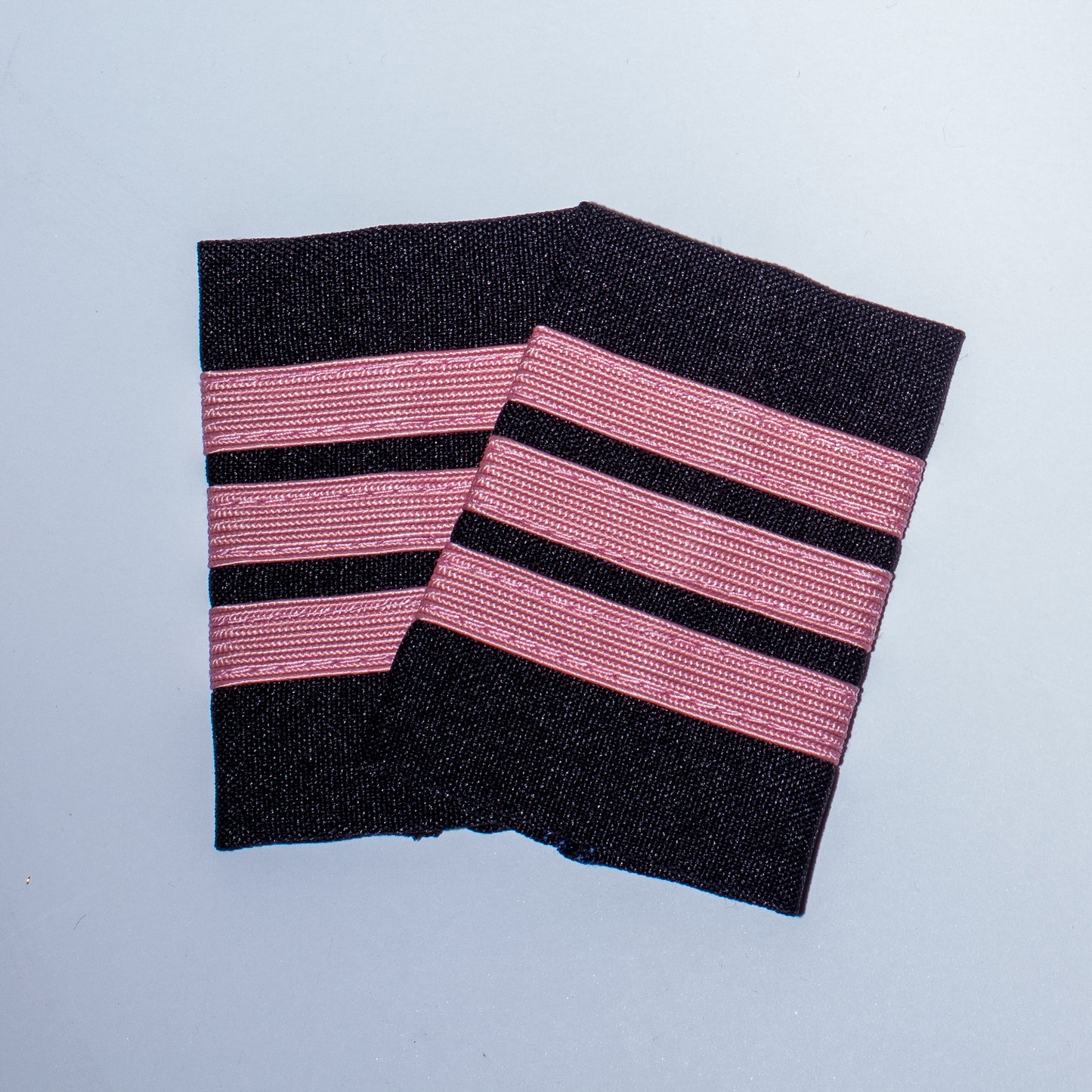 EPAULETS, PINK NYLON ON BLACK